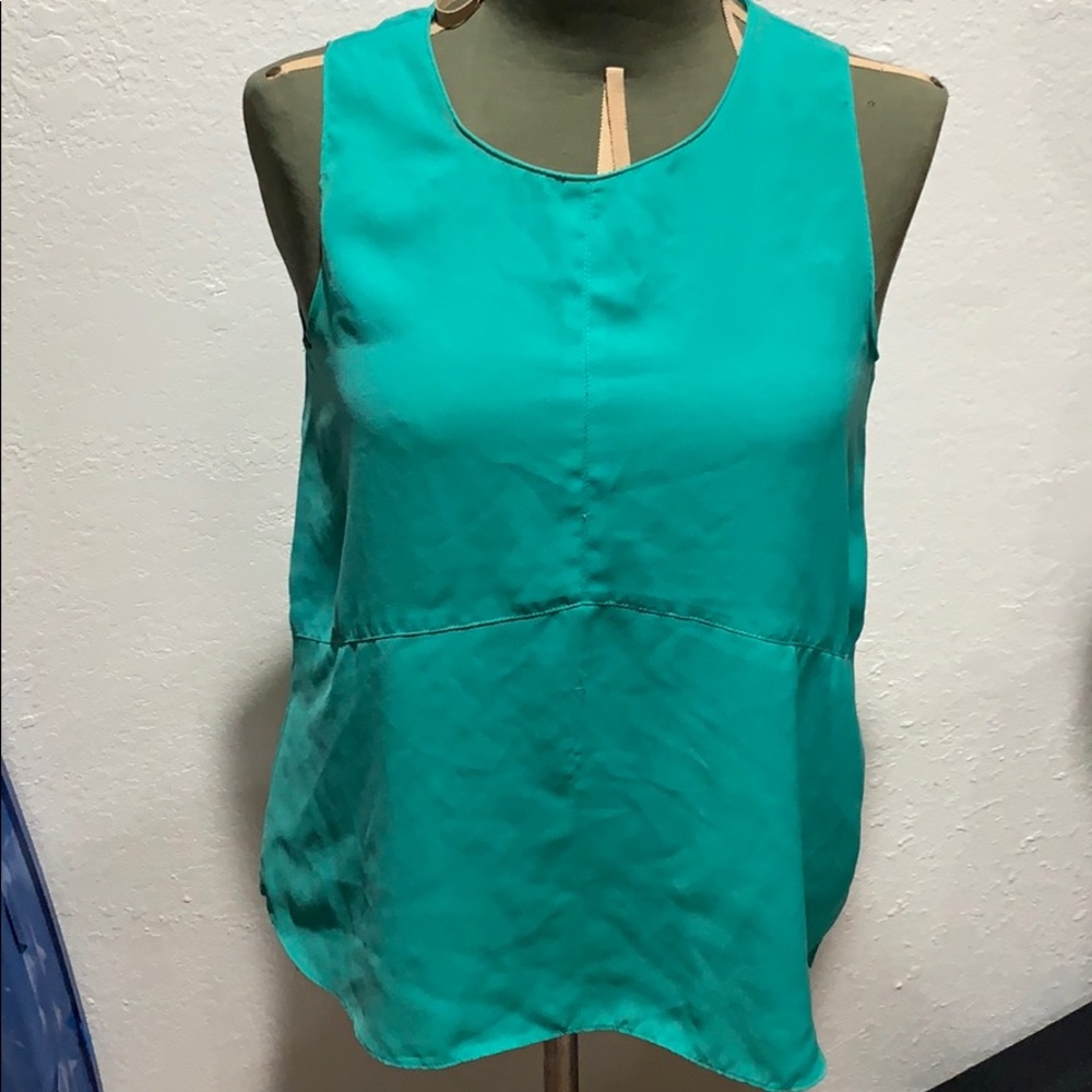 Silky teal long top wear with jeans or shorts.
